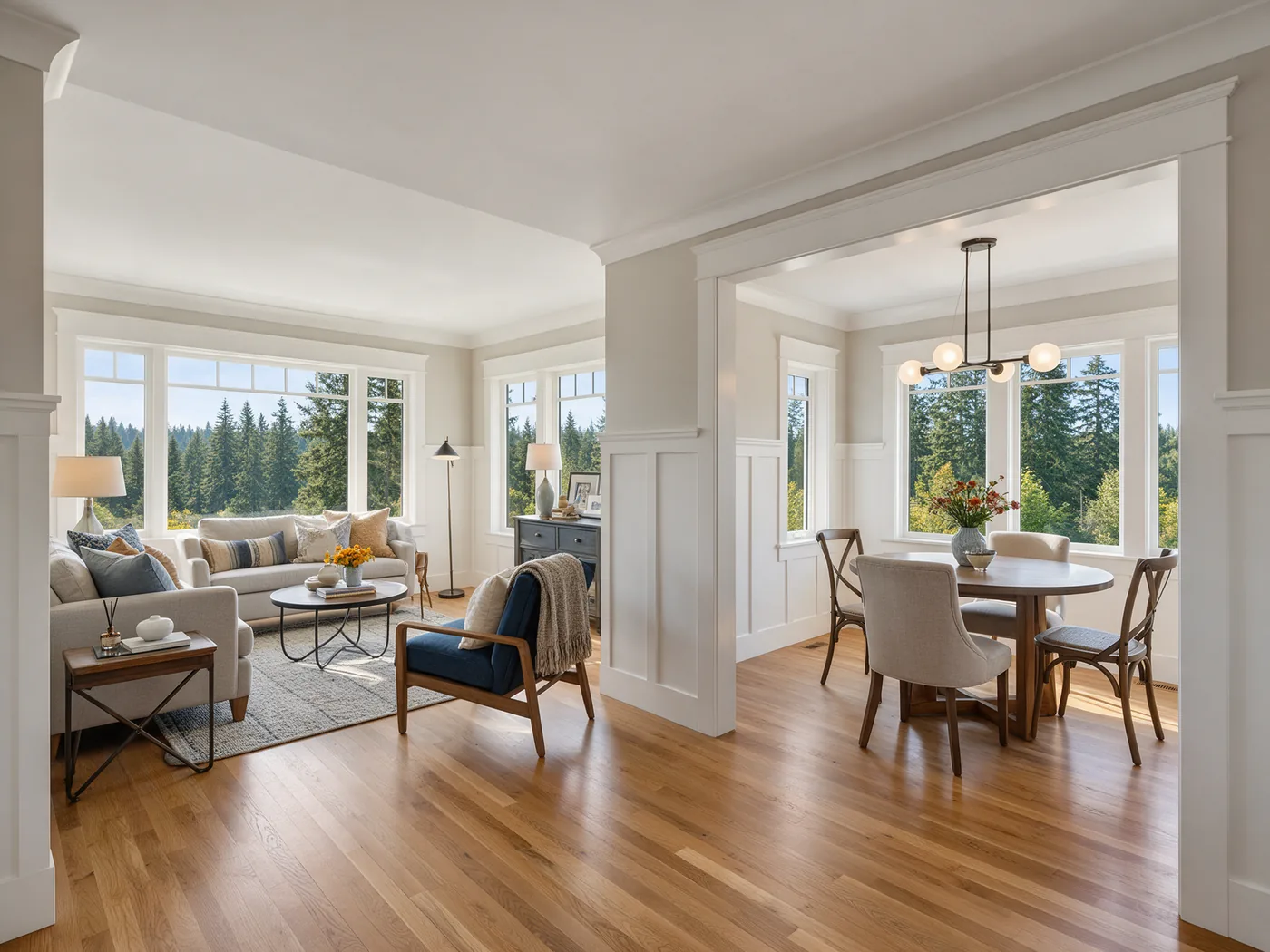 Bright open-concept living and dining room after a full remodel