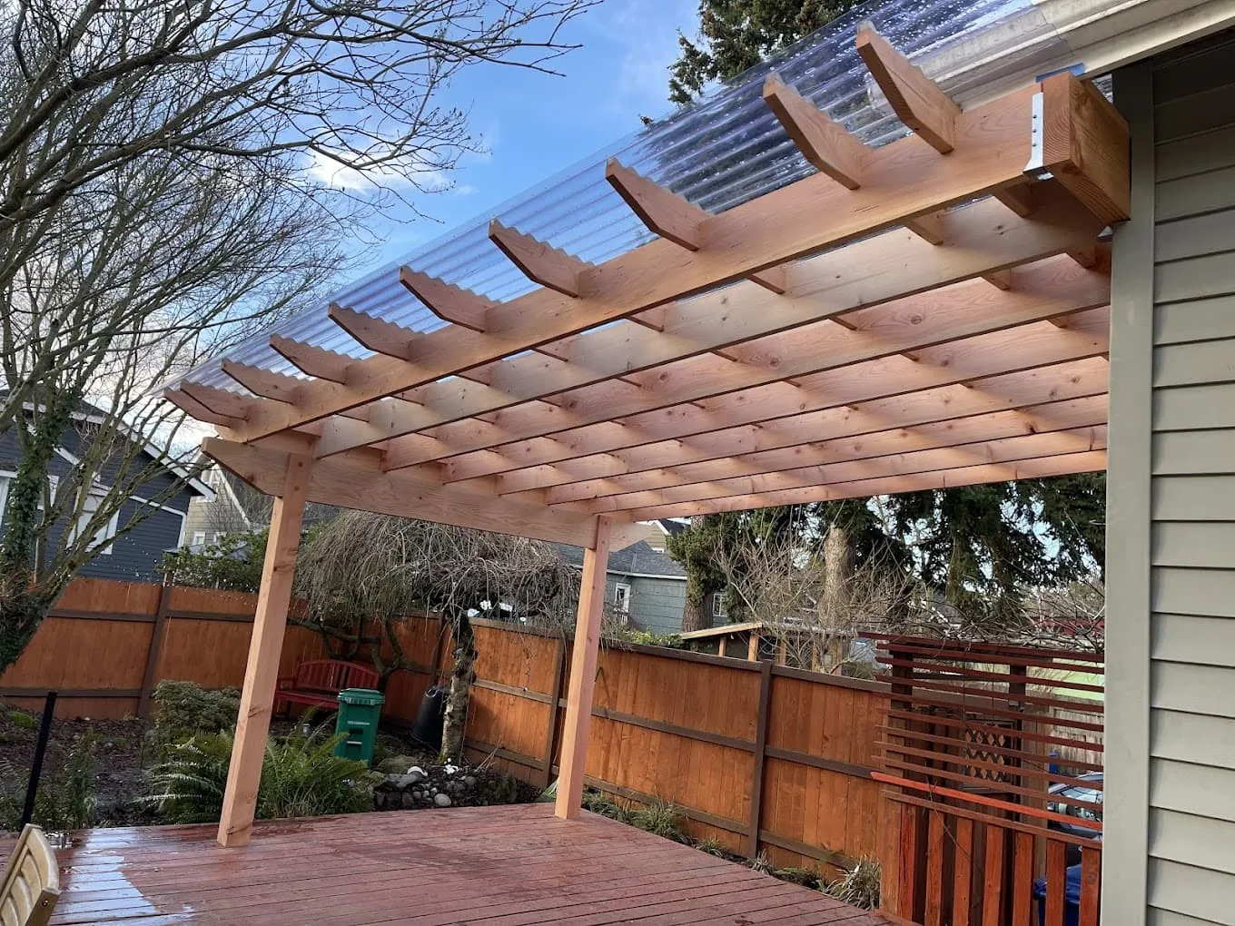 Pergola built onto the house creating an outdoor living space