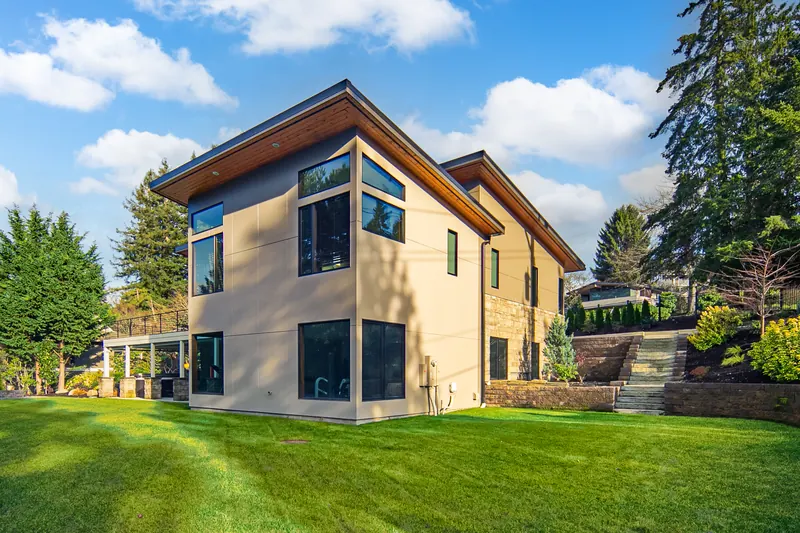 Side view of the modern home with shed roofs
