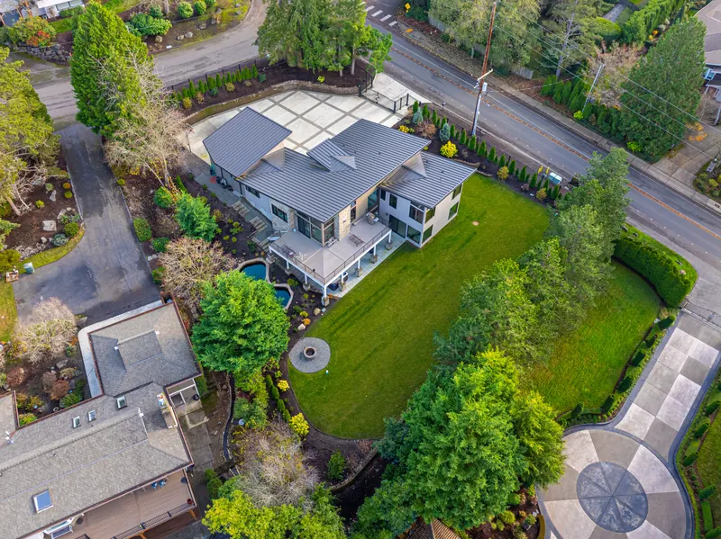 Aerial view of the backyard, pond and lawn