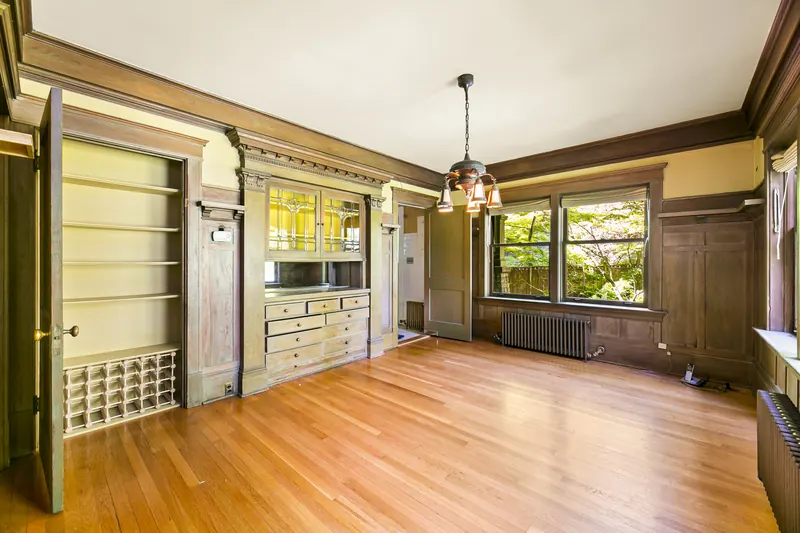 Built-in china cabinet with glass doors in the dining room